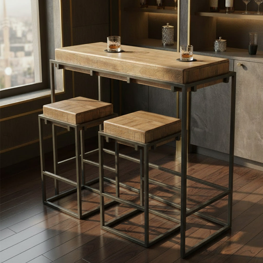 Solid acacia pub table with soft brown oil rub finish and iron leg frame with matching stools and footrest rail