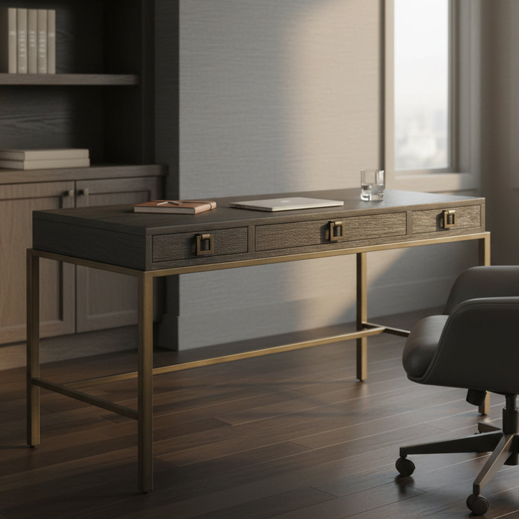 Writing desk with red oak veneers and select solids, three drawers, metal frame in antique brass, and Edgewater finish