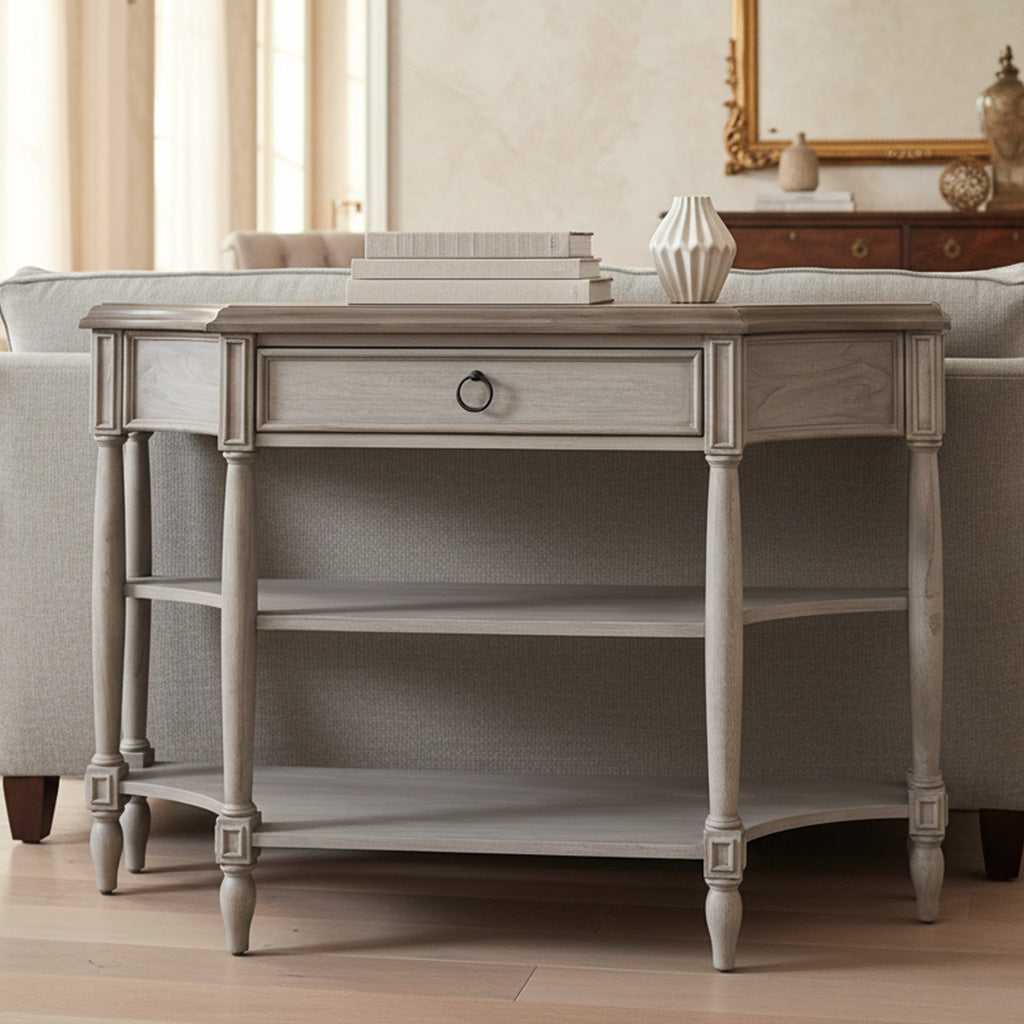 Gray wood sofa table with Georgian curves, round-turned legs, single center drawer, and two lower shelves