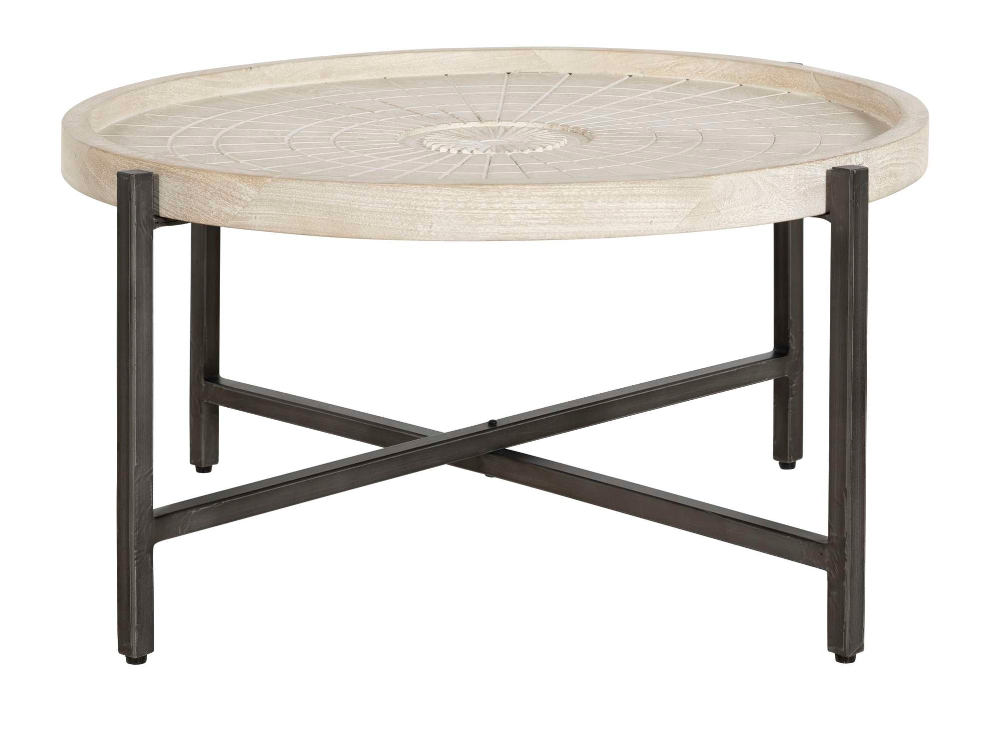 Round coffee table with carved sunburst top, raised gallery edge, and dark gray metal square base with stretchers