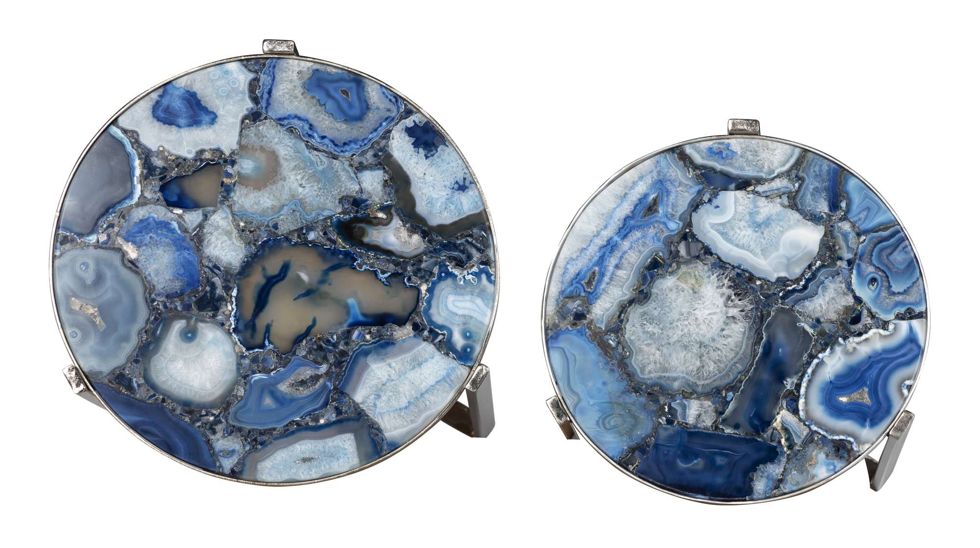 Set of two round nesting tables with polished blue agate stone tops and sleek silver metal bases in modern design