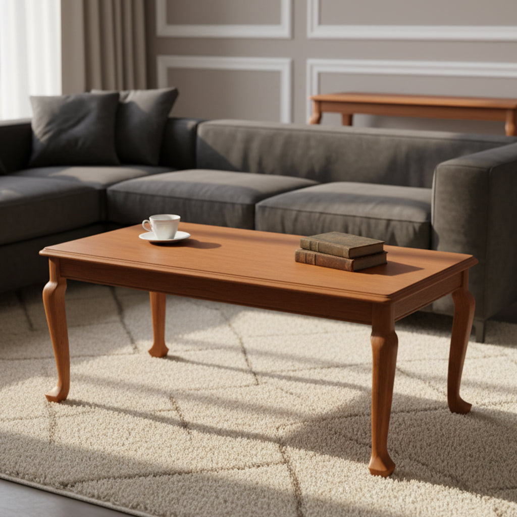 Caddington Coffee Table with warm wood finish and elegant Queen Ann legs on a textured rug in modern living room