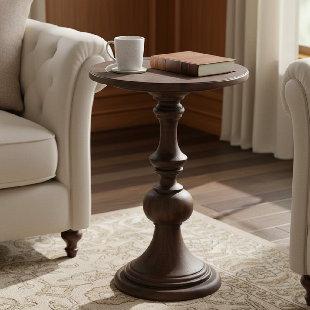 Napa Valley End Table with round shaped top, pedestal base, dark wood finish, styled with book and coffee cup on top