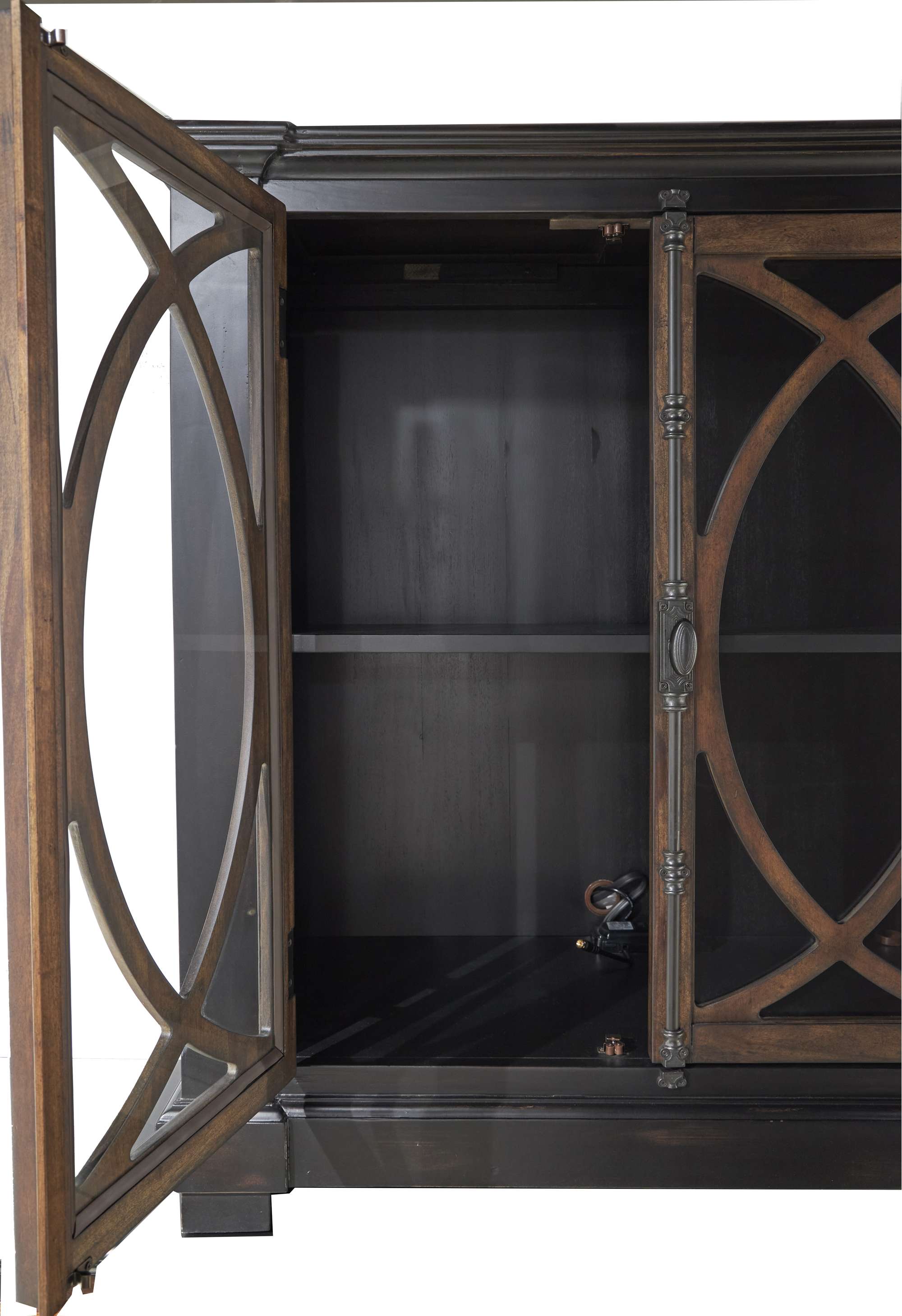 Accent chest with mahogany veneers and solids, two glass doors with antique brass latch, interior shelves, and power outlet pack
