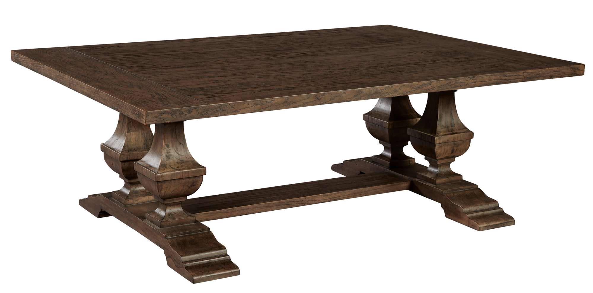 Wexford Slab Top Coffee Table with 1½" oak veneer and mindi wood top, carved bulbous pedestals, and trestle base design