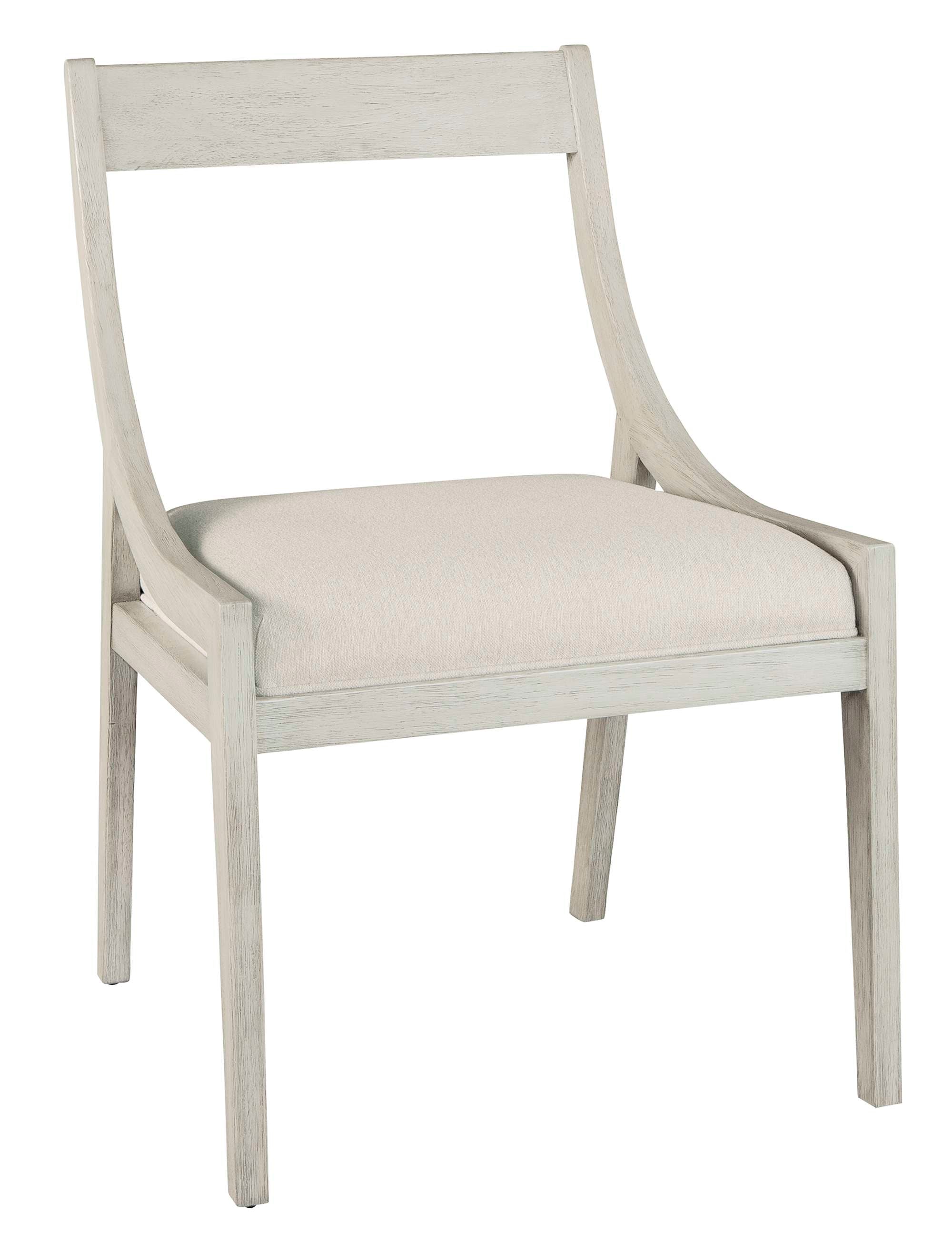 Sierra Heights Sling dining arm chair with mindi veneer and solids, soft white linen seat fabric, and Sierra finish frame