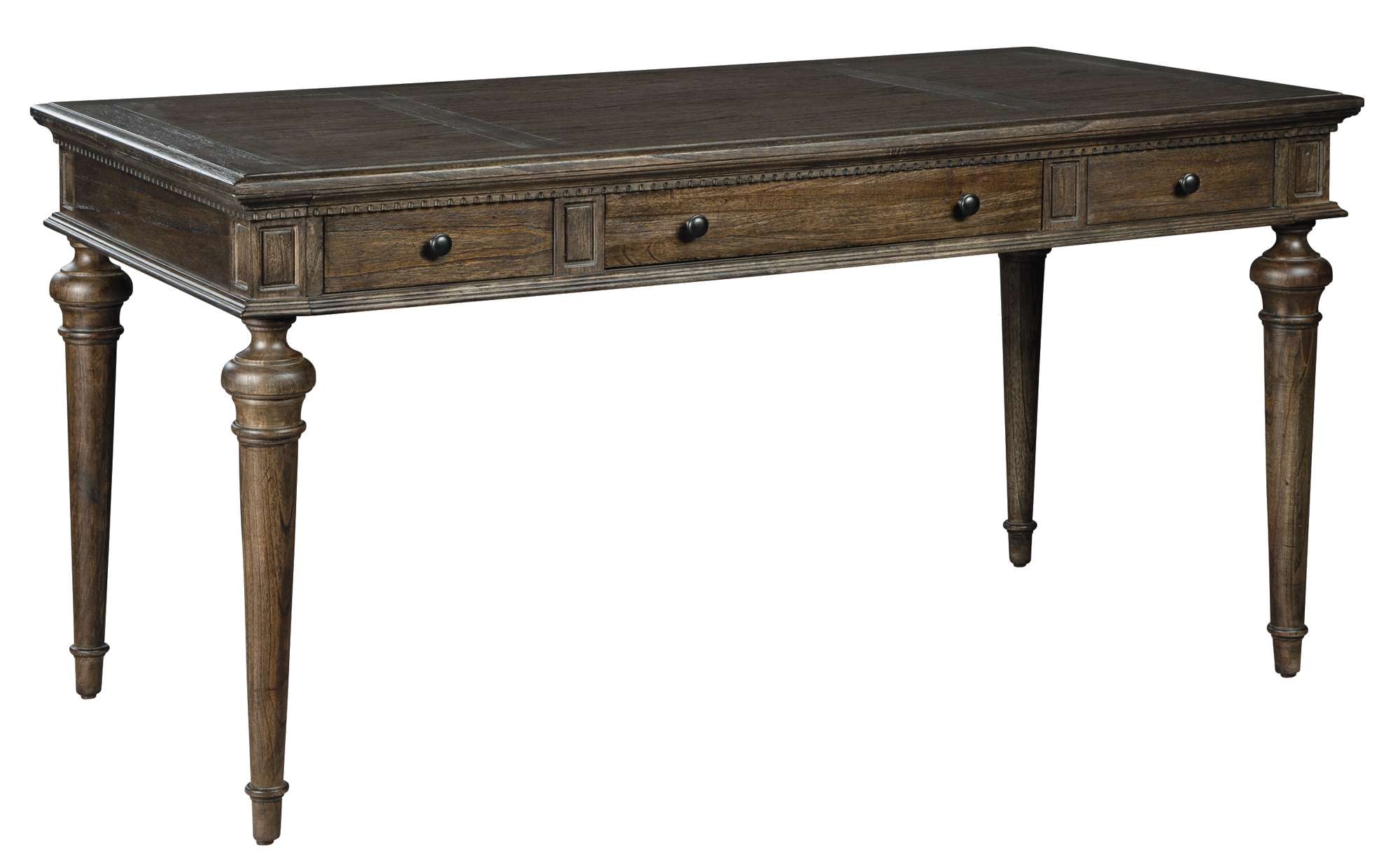Wellington Estates office desk with mindi veneers and solids, drop front center drawer, antique brass hardware, and tapered legs