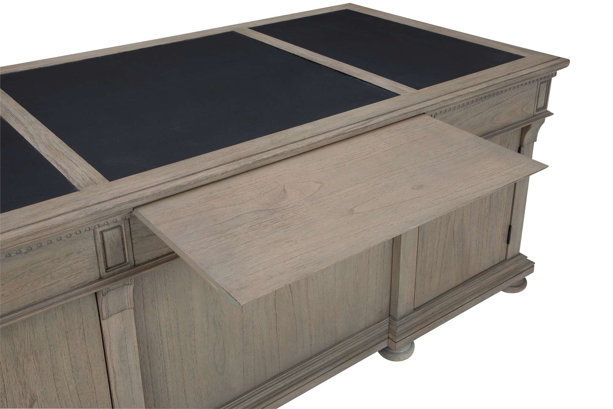 Wellington Estates executive desk with leather top panels, mindi wood finish, drop front drawer, and detailed molding accents