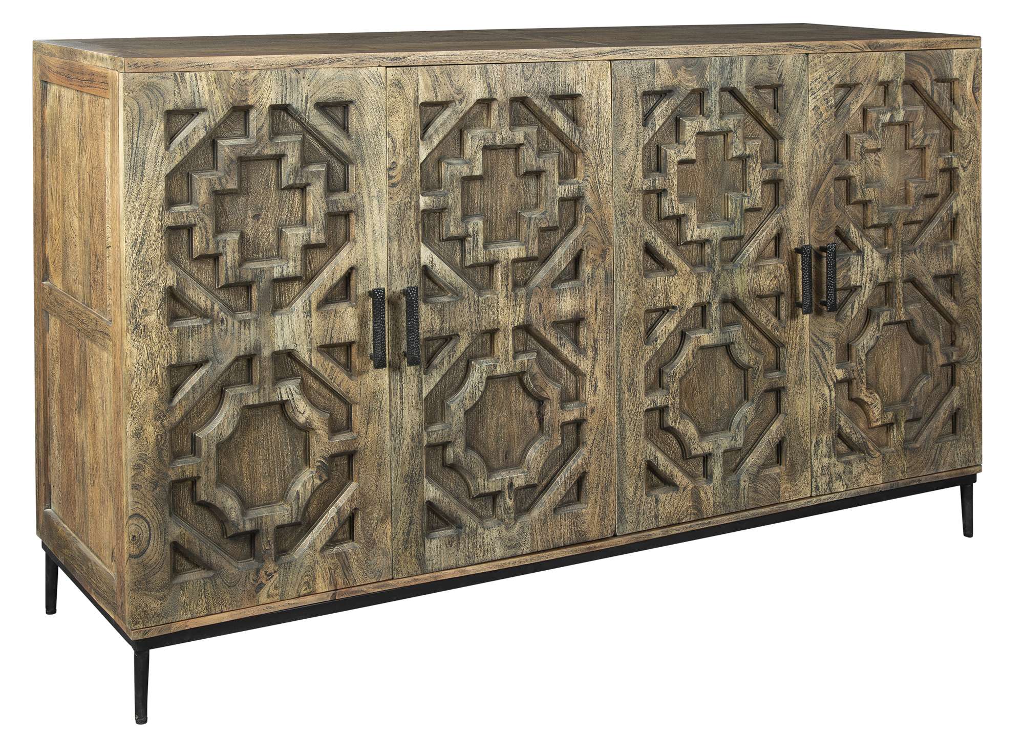 Entertainment console in mango solids with carved geometric door panels, forged iron base, and black metal hardware