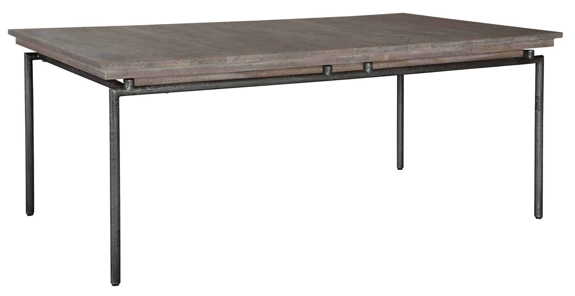 Sedona dining table with solid mango slab top, round iron legs, and a trestle mechanism for expandable leaves