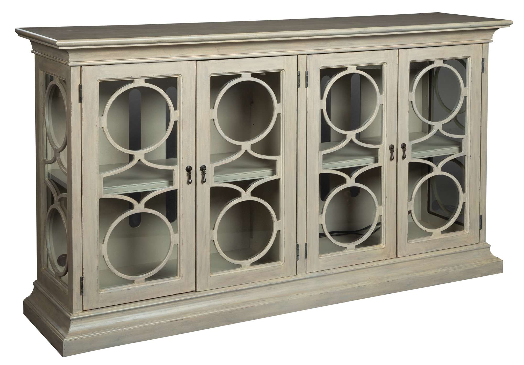 Entertainment console with select wood veneers, four glass doors featuring decorative circular frets, and adjustable interior shelves