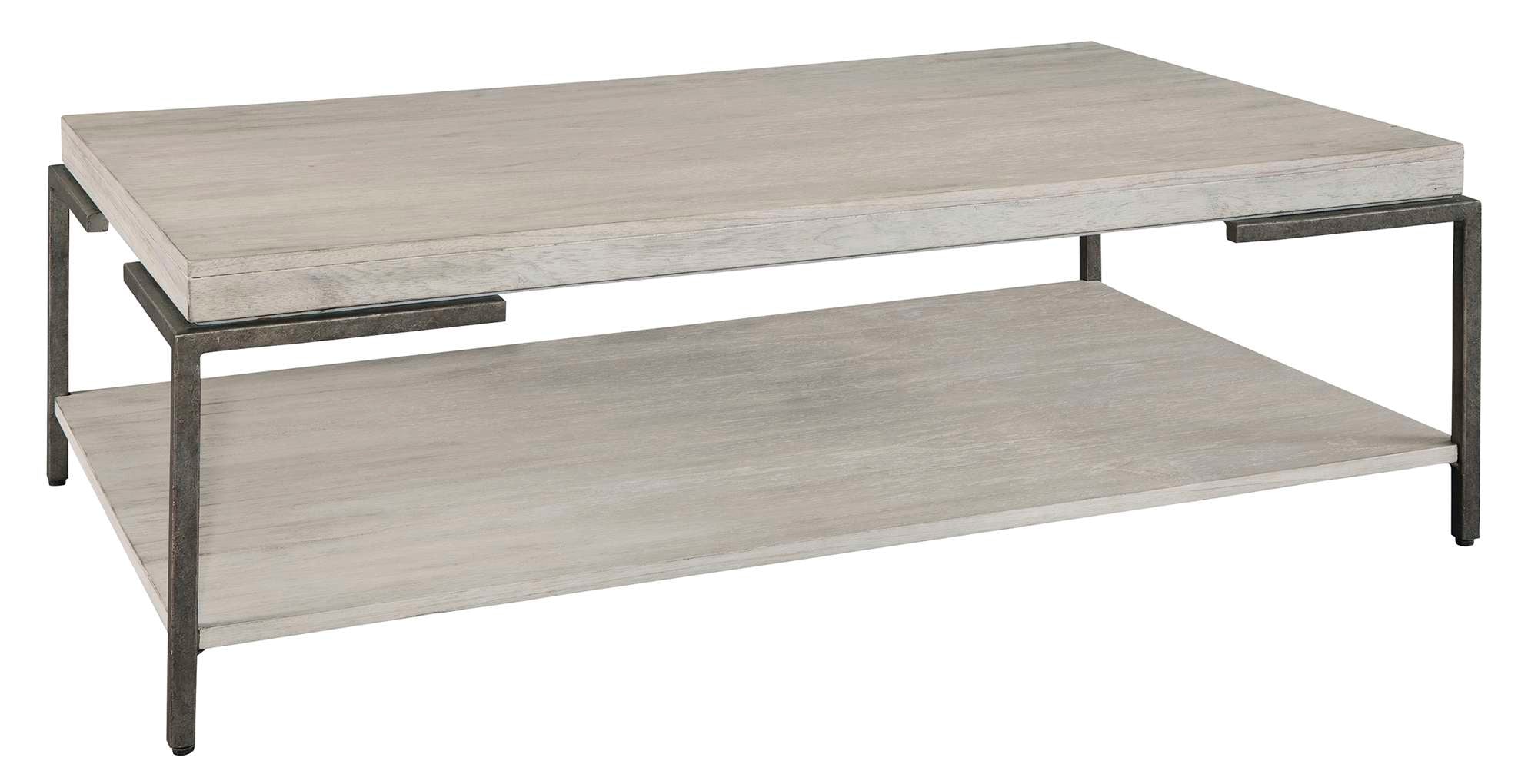 Sierra Heights coffee table with mindi veneer top, solid black iron legs, and lower slab panel shelf in Sierra finish