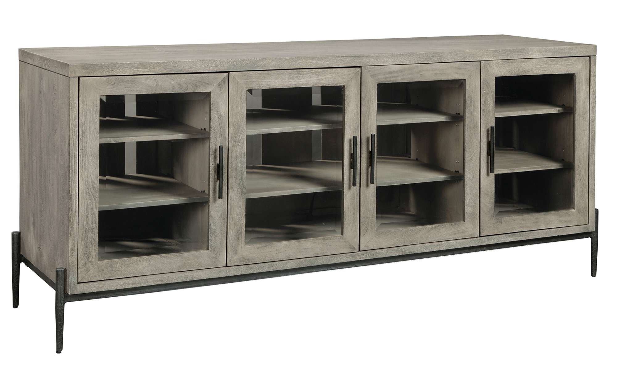 Bedford Park Entertainment Console in gray finish with four glass doors, metal handles, adjustable interior shelves, and black metal legs