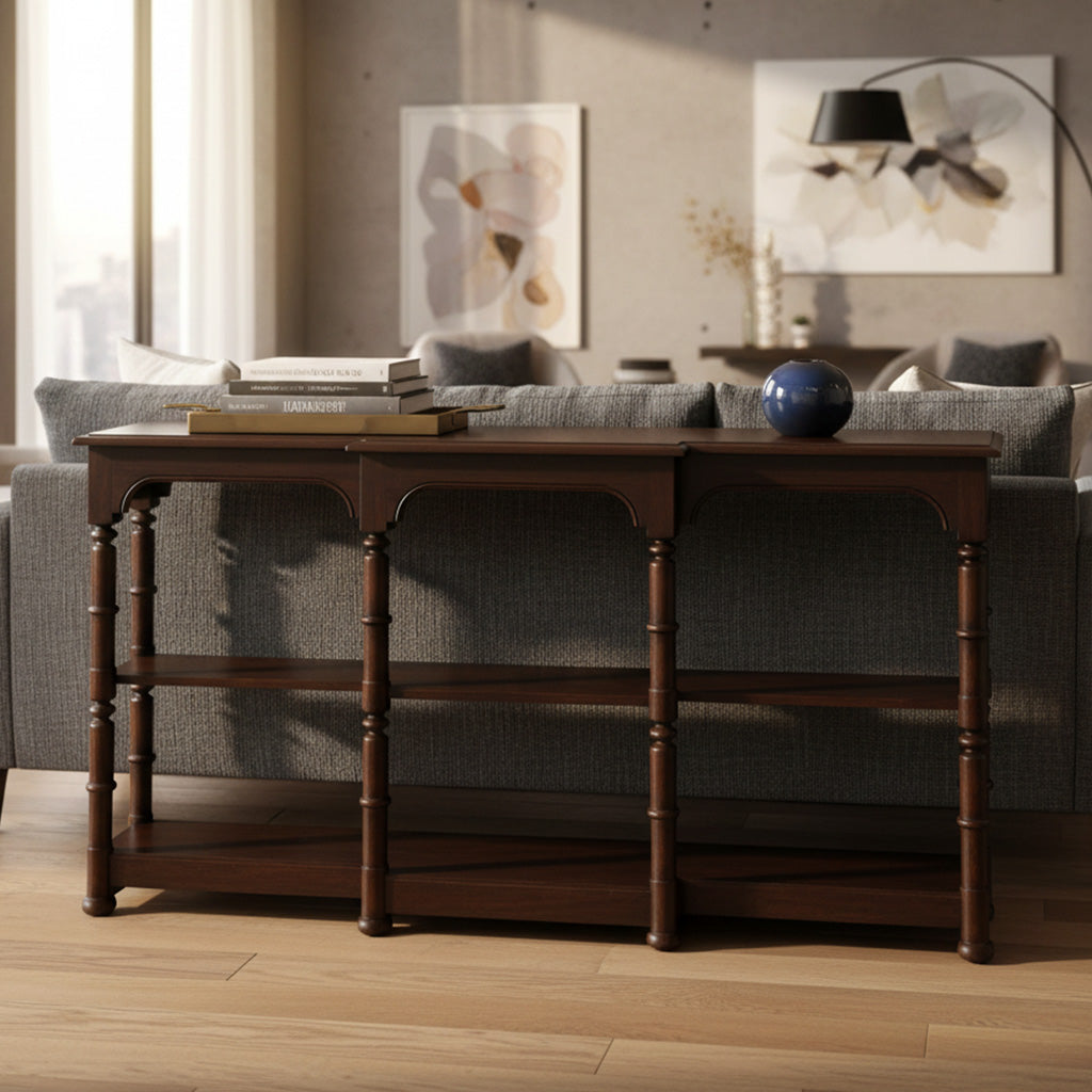 Mahogany sofa table with brown oiled finish, two open shelves, breakfront design, and faux bamboo posts in living room