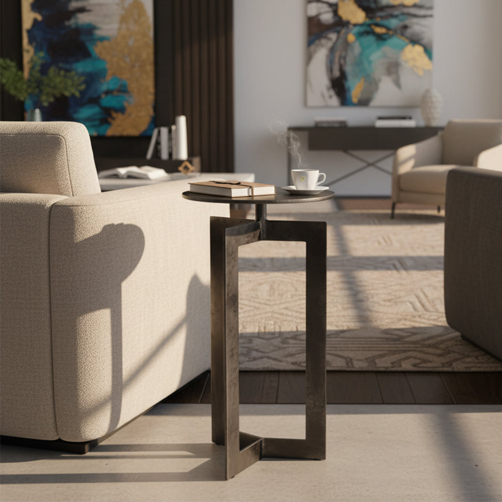 Black nickel iron accent table with open geometric base and round top, ideal for contemporary or industrial decor