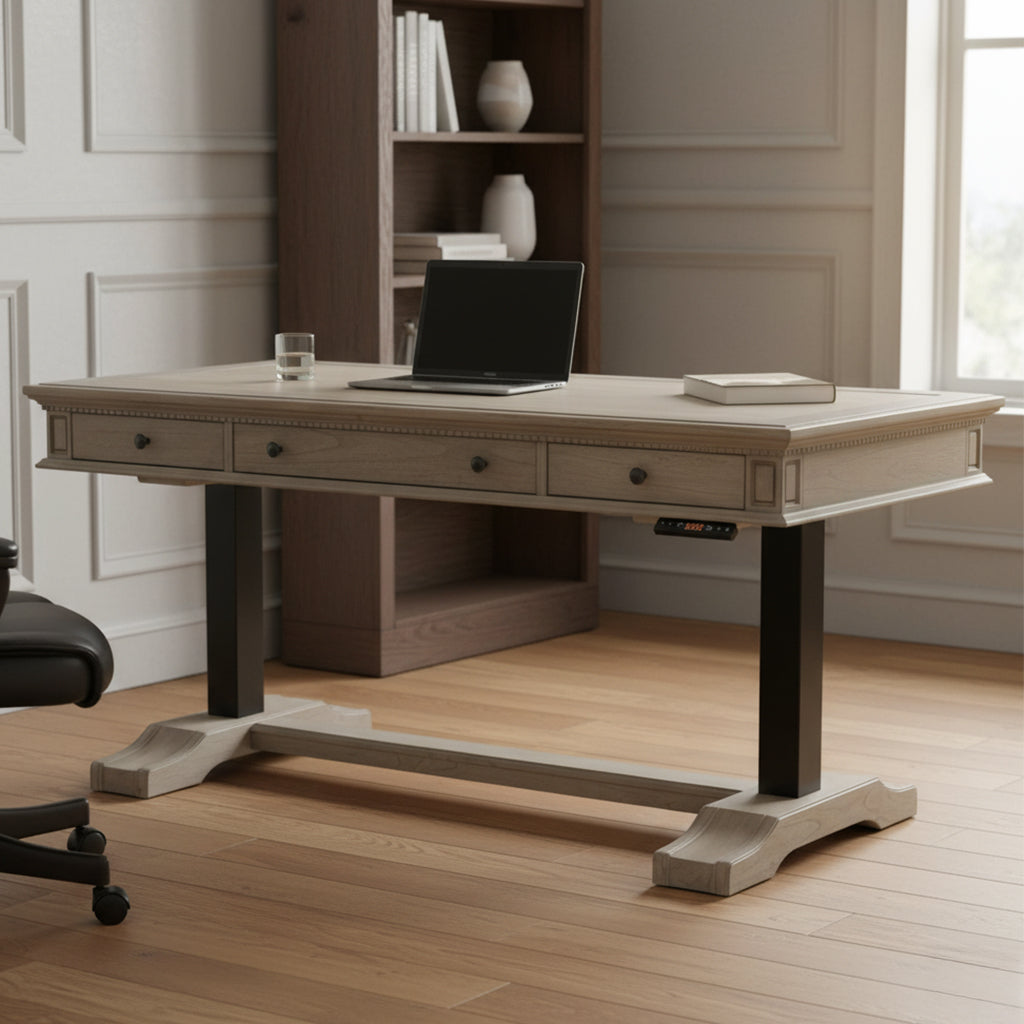 Light wood sit-stand desk with three drawers, black metal legs, laptop, book, glass of water in modern office setting
